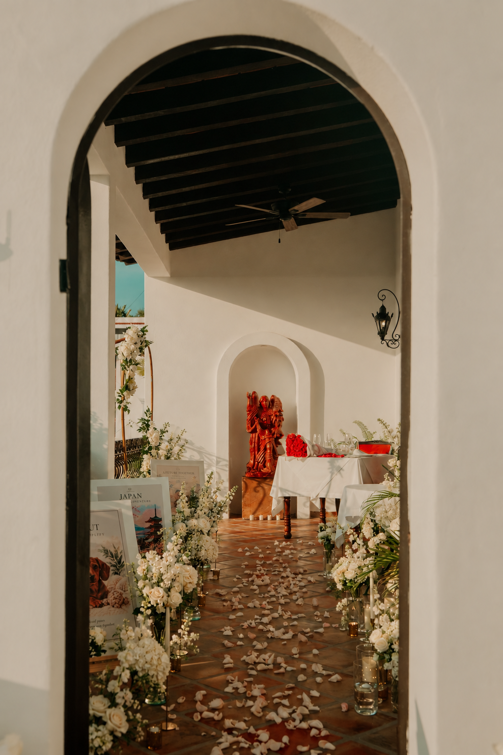 Elegant white floral aisle leading to the proposal spot